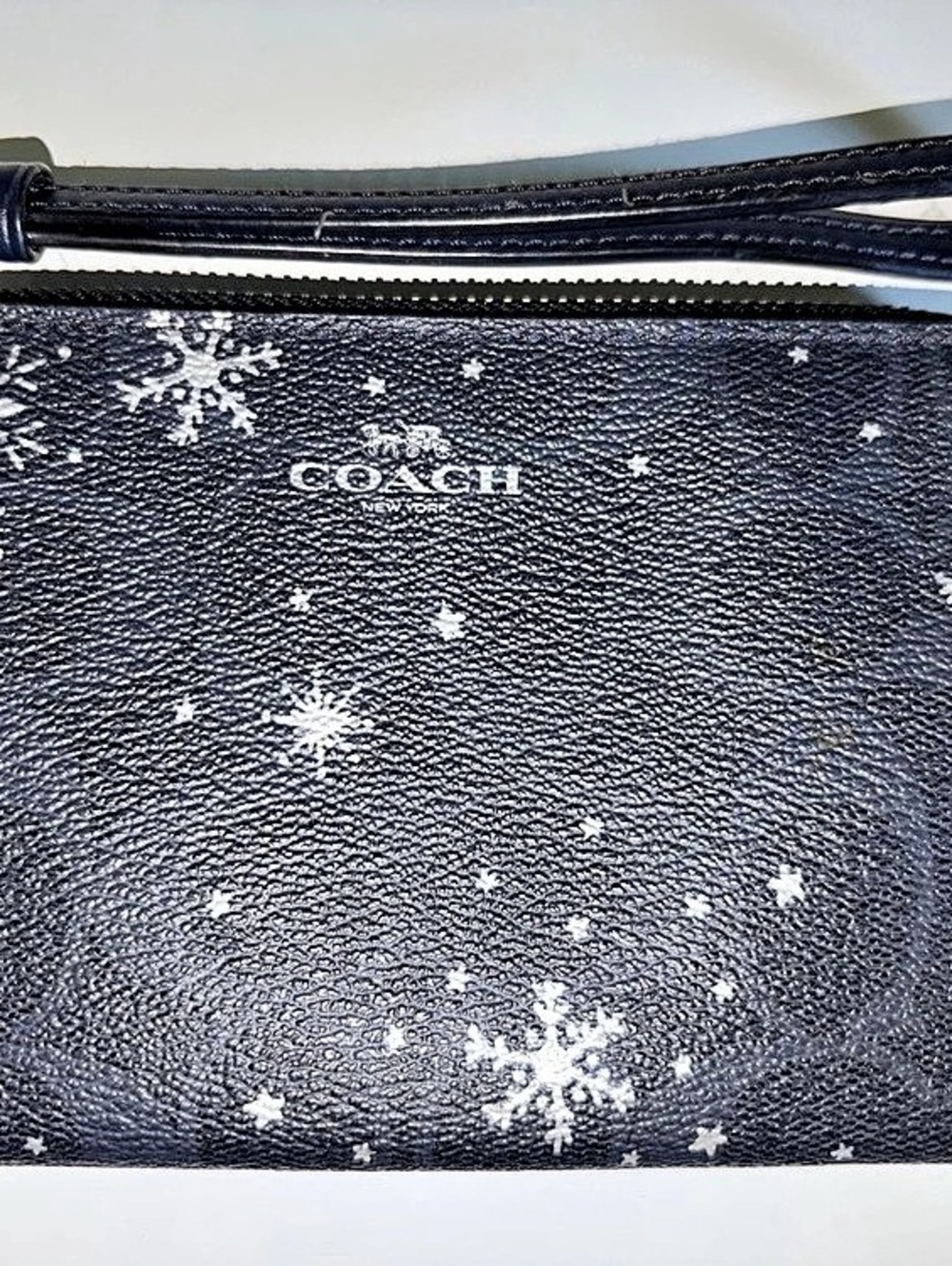 Coach Corner Zip Wristlet With Star And Snowflake Print